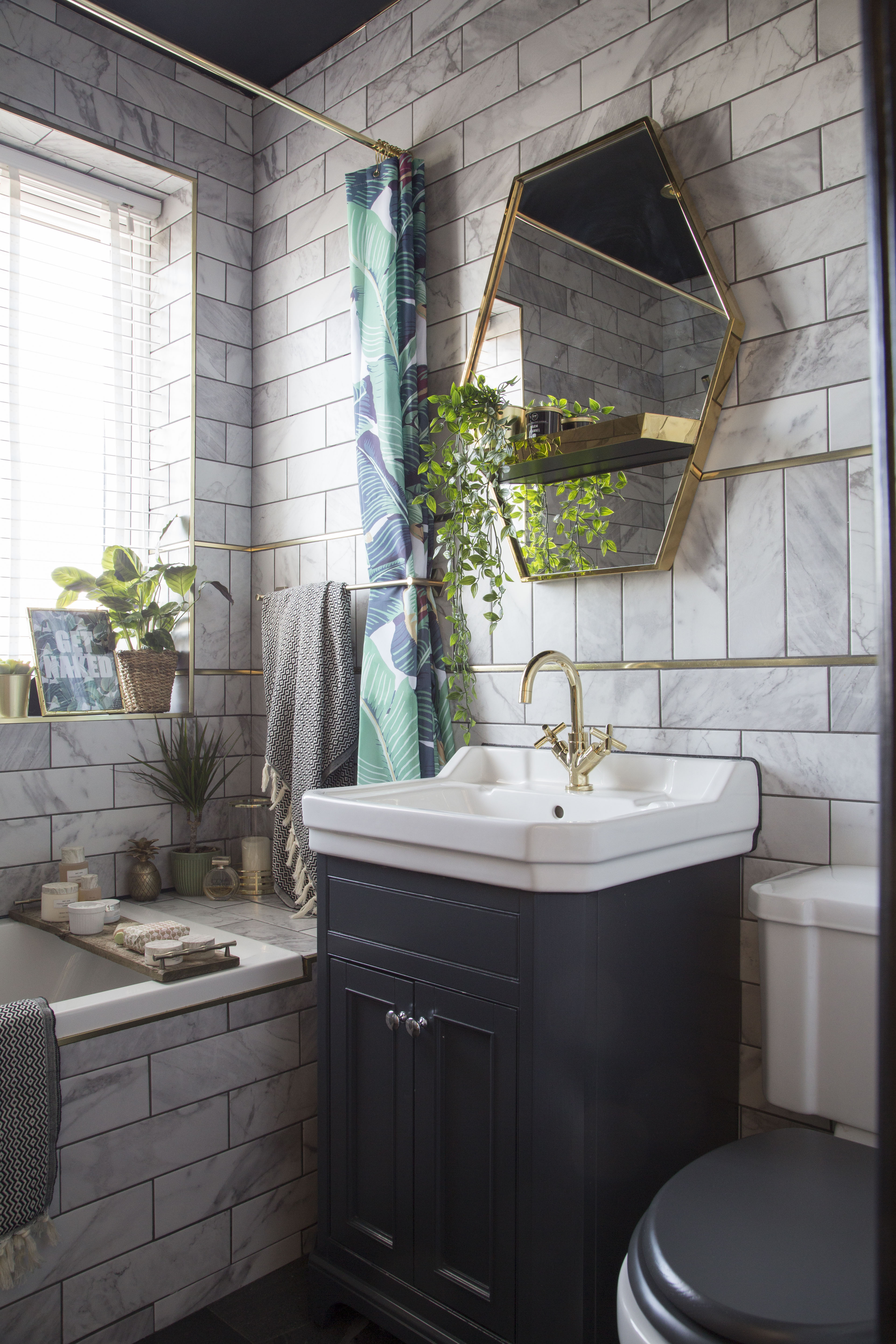 ‘I decided, while designing the new bathroom, that I wanted marble, but I didn’t want to pay marble prices,’ says Kirstie. ‘I also wanted something durable that wouldn’t stain, so I opted for a marble-effect tile that gave me the look I was after for much less’ ‘I decided, while designing the new bathroom, that I wanted marble, but I didn’t want to pay marble prices,’ says Kirstie. ‘I also wanted something durable that wouldn’t stain, so I opted for a marble-effect tile that gave me the look I was after for much less’