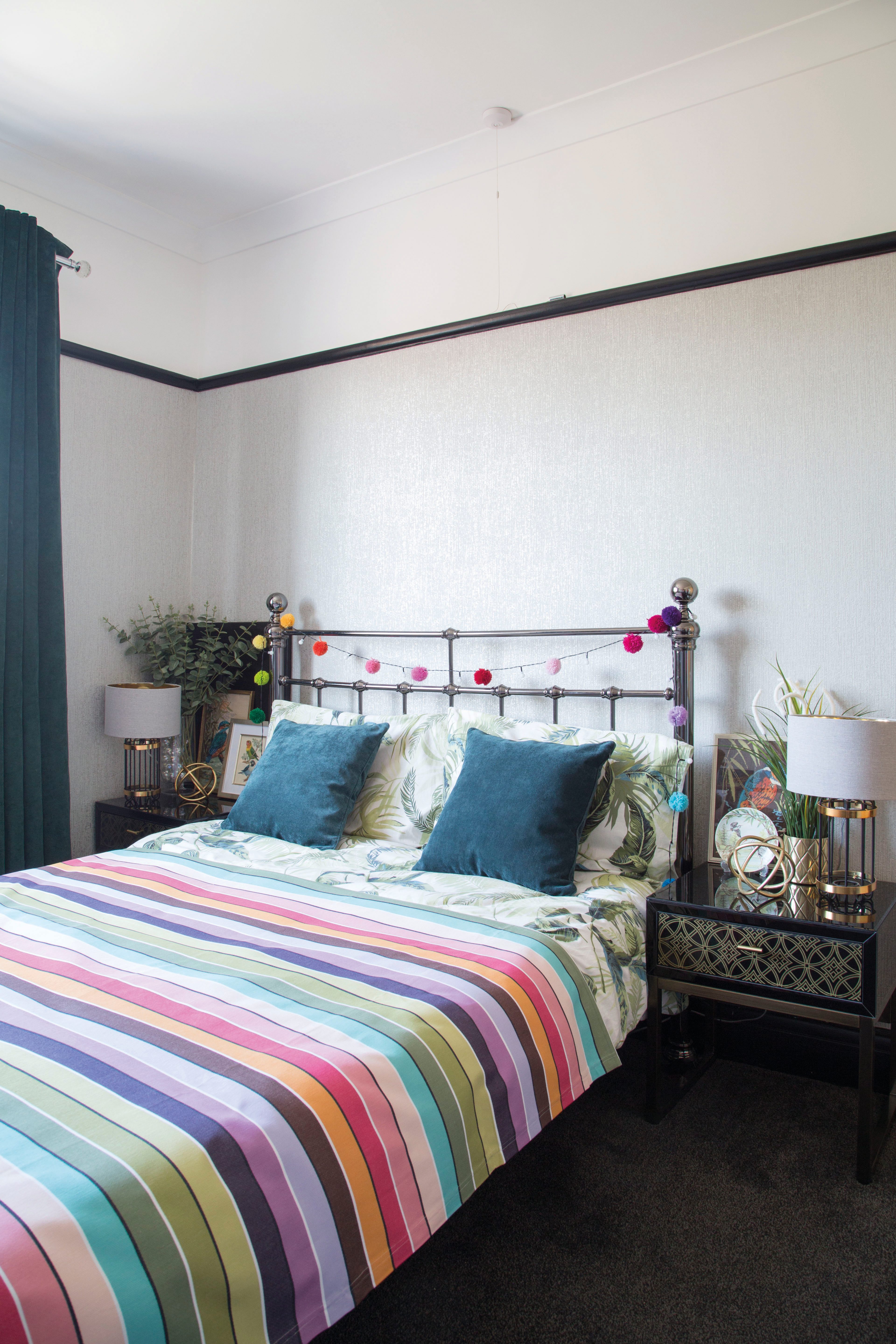 kirstie - dotty about design7973_1 Kirstie opted for wallpaper in the spare bedroom to add texture, as the space was fairly pared-back. Black woodwork gives a contemporary finish