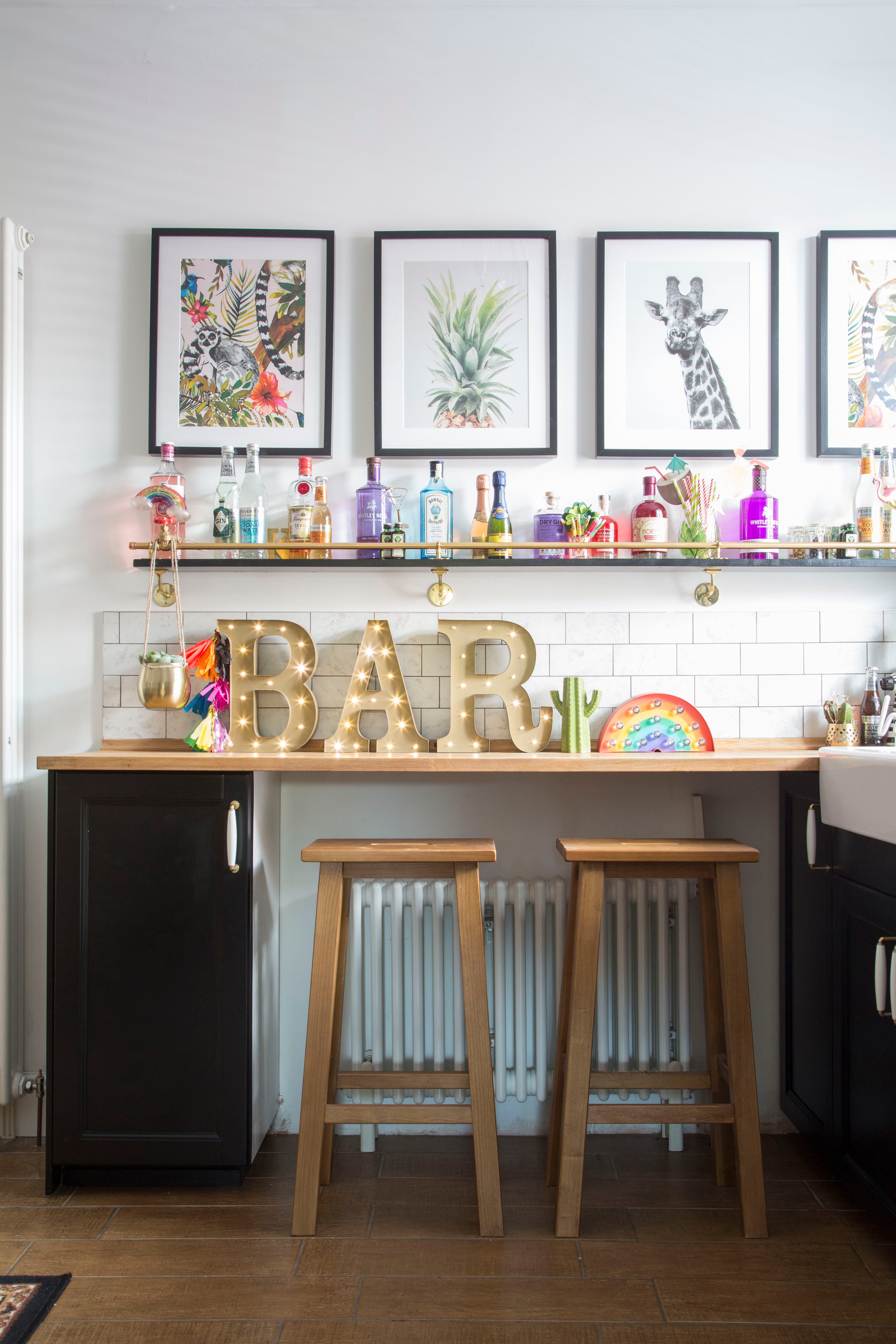 ‘My favourite make in the kitchen has to be my gin shelves,’ says Kirstie. ‘They were easy to build using basic timber and plumbing fittings, and they really lift the space with all of the colourful bottles on display’ ‘My favourite make in the kitchen has to be my gin shelves,’ says Kirstie. ‘They were easy to build using basic timber and plumbing fittings, and they really lift the space with all of the colourful bottles on display’