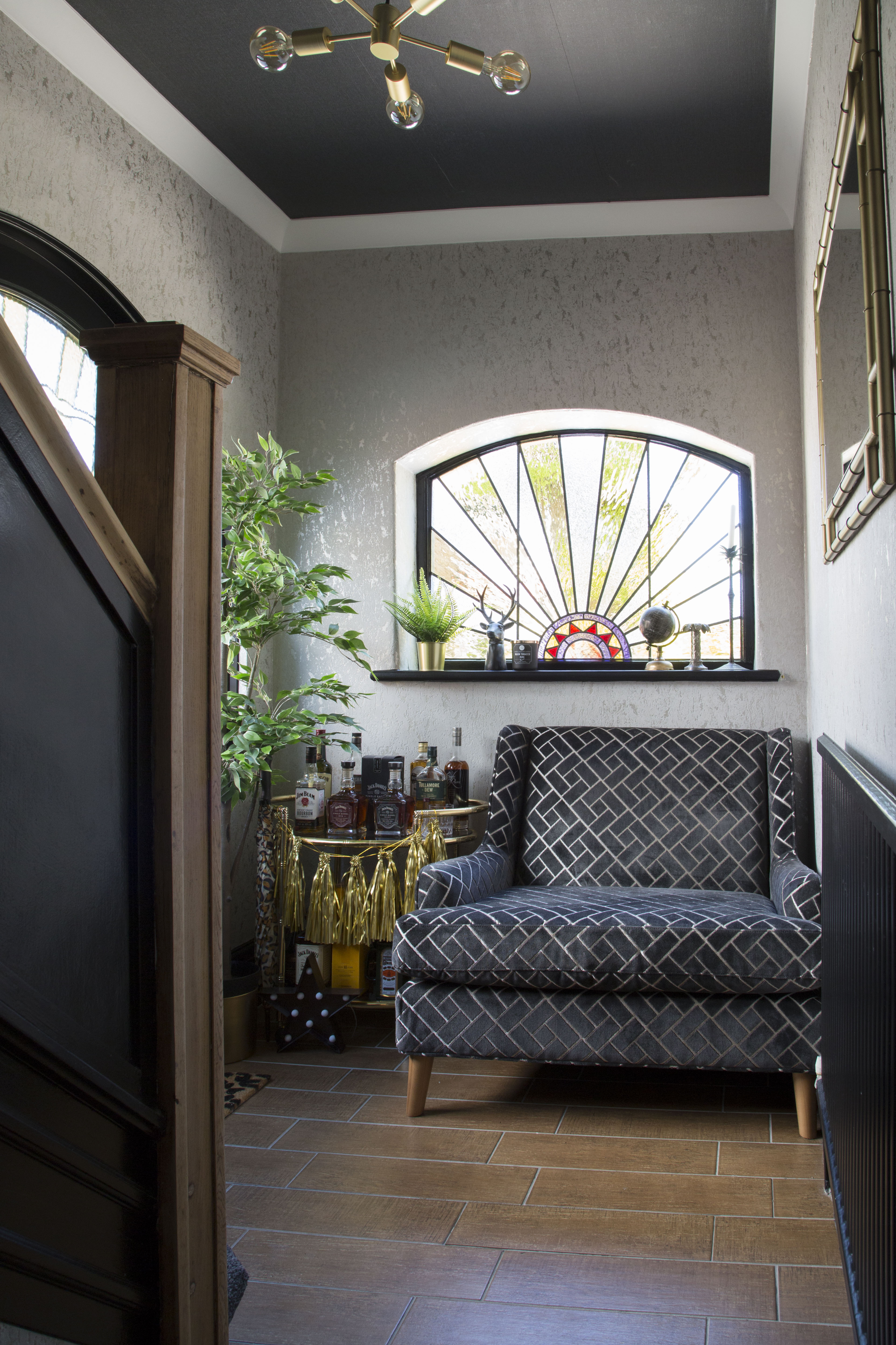 ‘I put off decorating the hallway for so long,’ Kirstie confesses. ‘But it wasn’t as bad as I thought it would be. We put up coving, papered the ceiling with a dark, plain design and hung a light paper with a gold sheen on the walls’ ‘I put off decorating the hallway for so long,’ Kirstie confesses. ‘But it wasn’t as bad as I thought it would be. We put up coving, papered the ceiling with a dark, plain design and hung a light paper with a gold sheen on the walls’